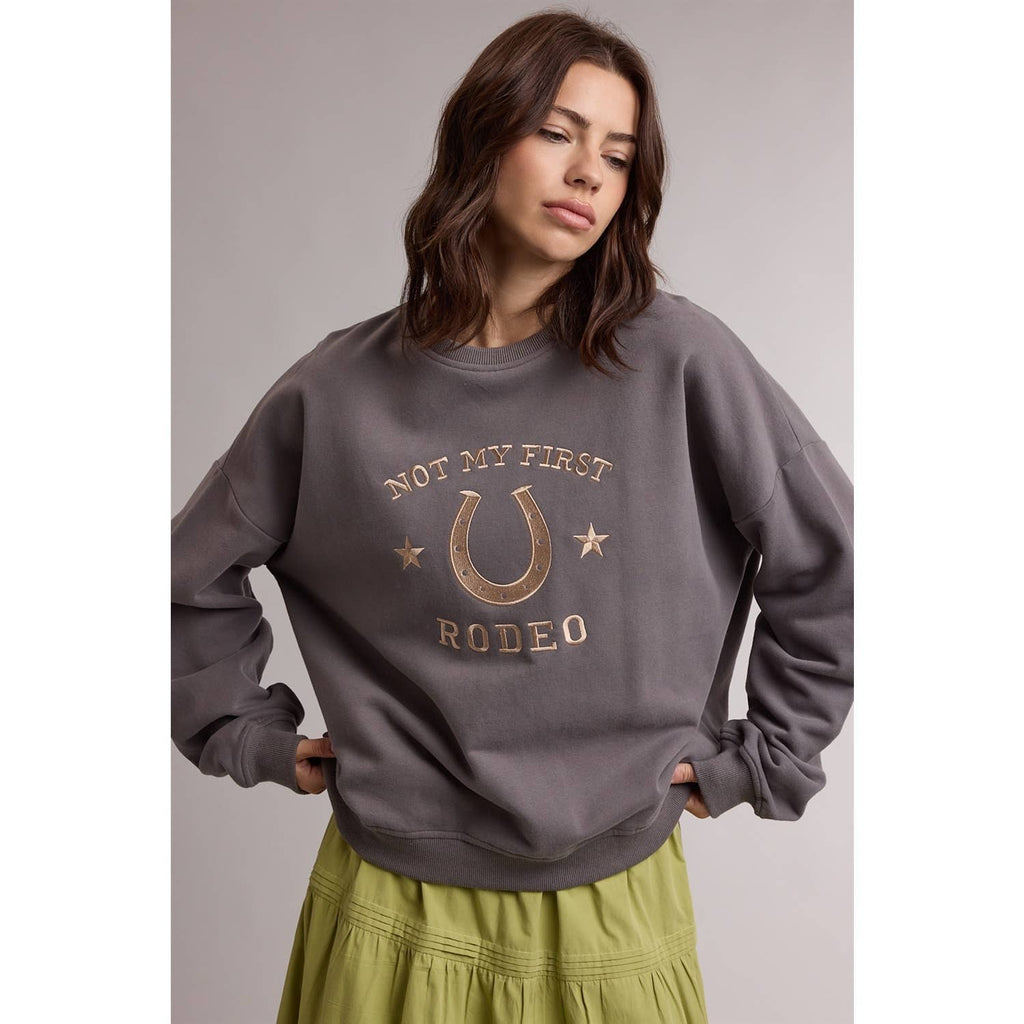 NOT MY FIRST RODEO SWEATSHIRT