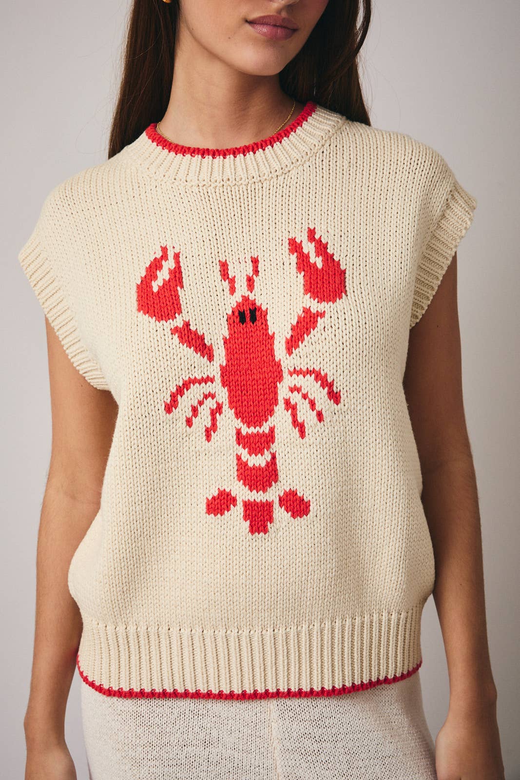 WIDE HIGH NECK SLEEVELESS "LOBSTER" SWEATER