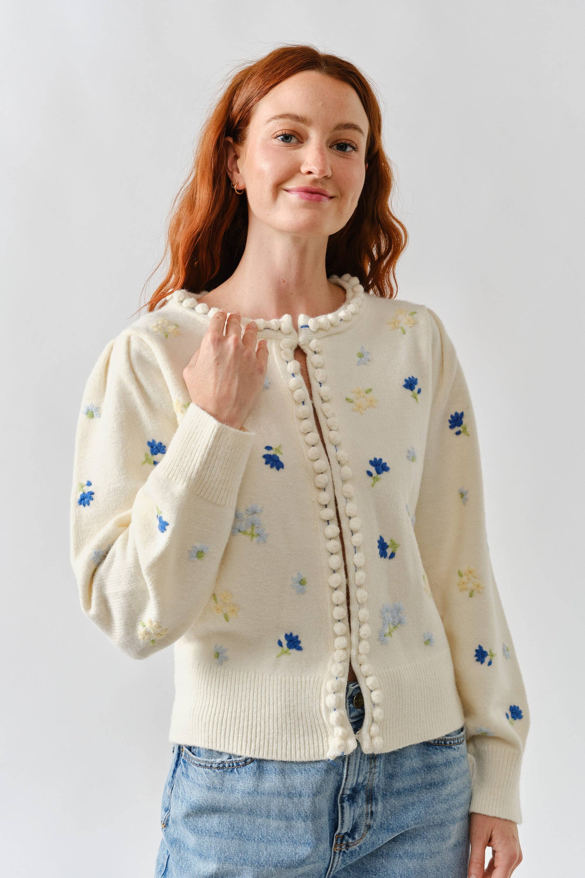 FLOWER EMBROIDERED CARDIGAN W/POMPOM EDGE